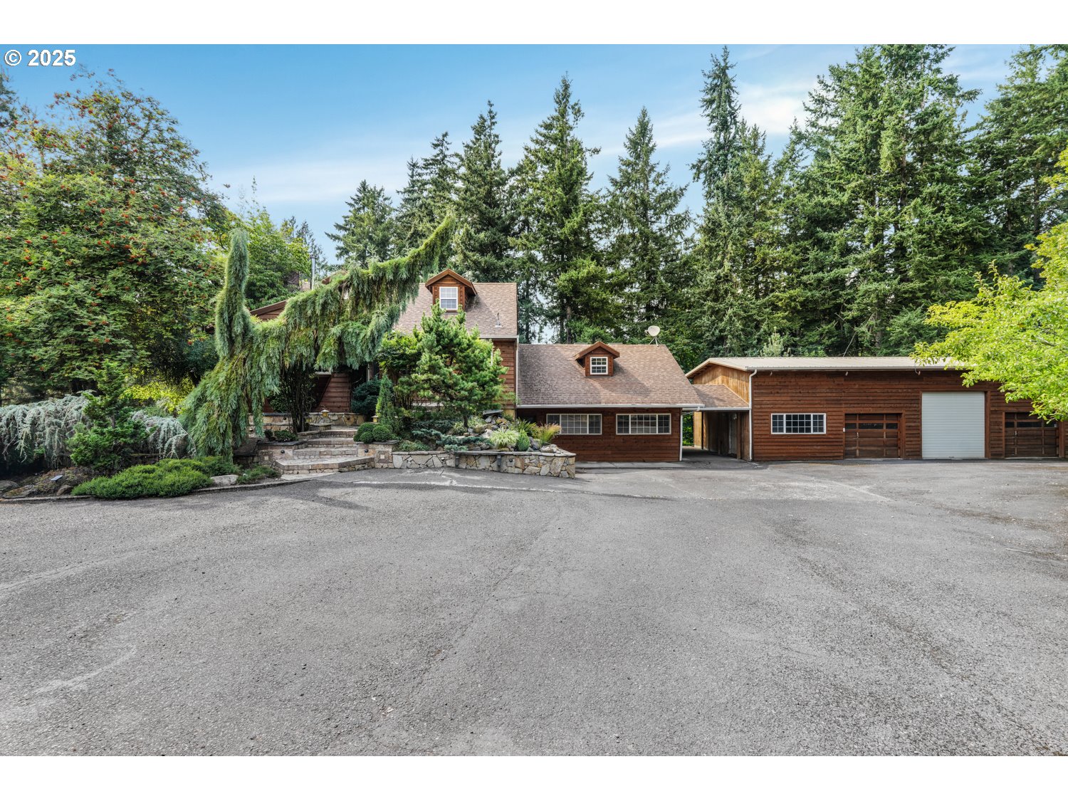 15145 Southeast Anderson Road Damascus, OR 97089 - Photo 1 of 34 a car parked in front of a house with a yard