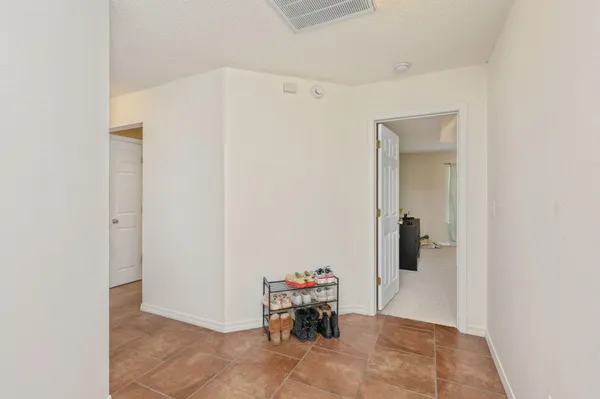 a hallway with a white stove