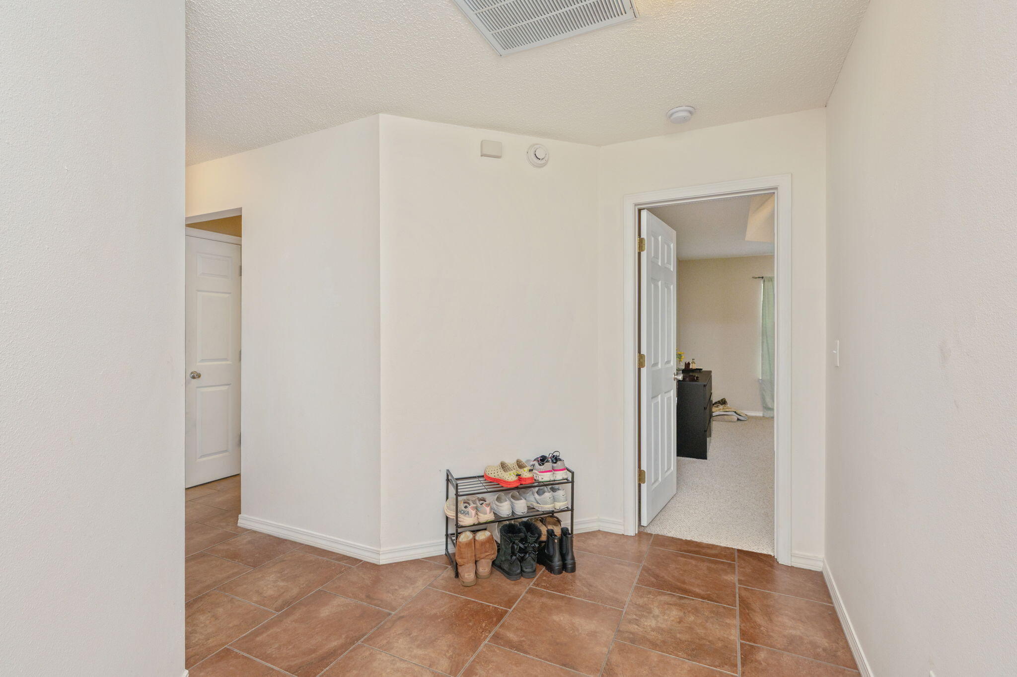 109 Tranquility Drive Crestview, FL 32536 - Photo 18 of 41 a hallway with a white stove