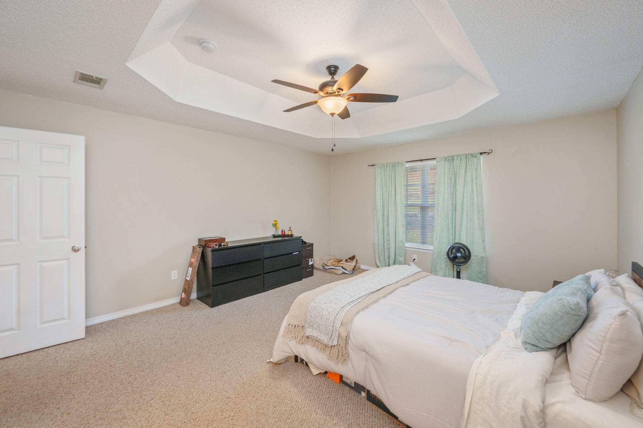 109 Tranquility Drive Crestview, FL 32536 - Photo 19 of 41 a bedroom with a bed and a ceiling fan