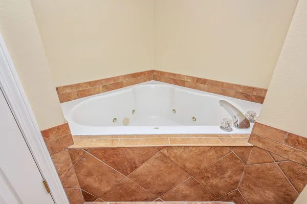 a bathroom with a bathtub