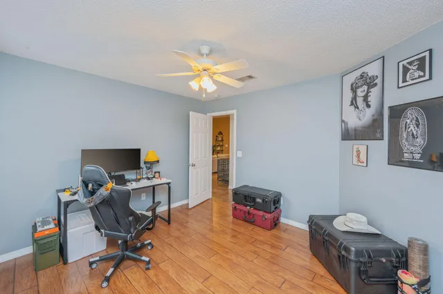 a workspace with furniture and a window