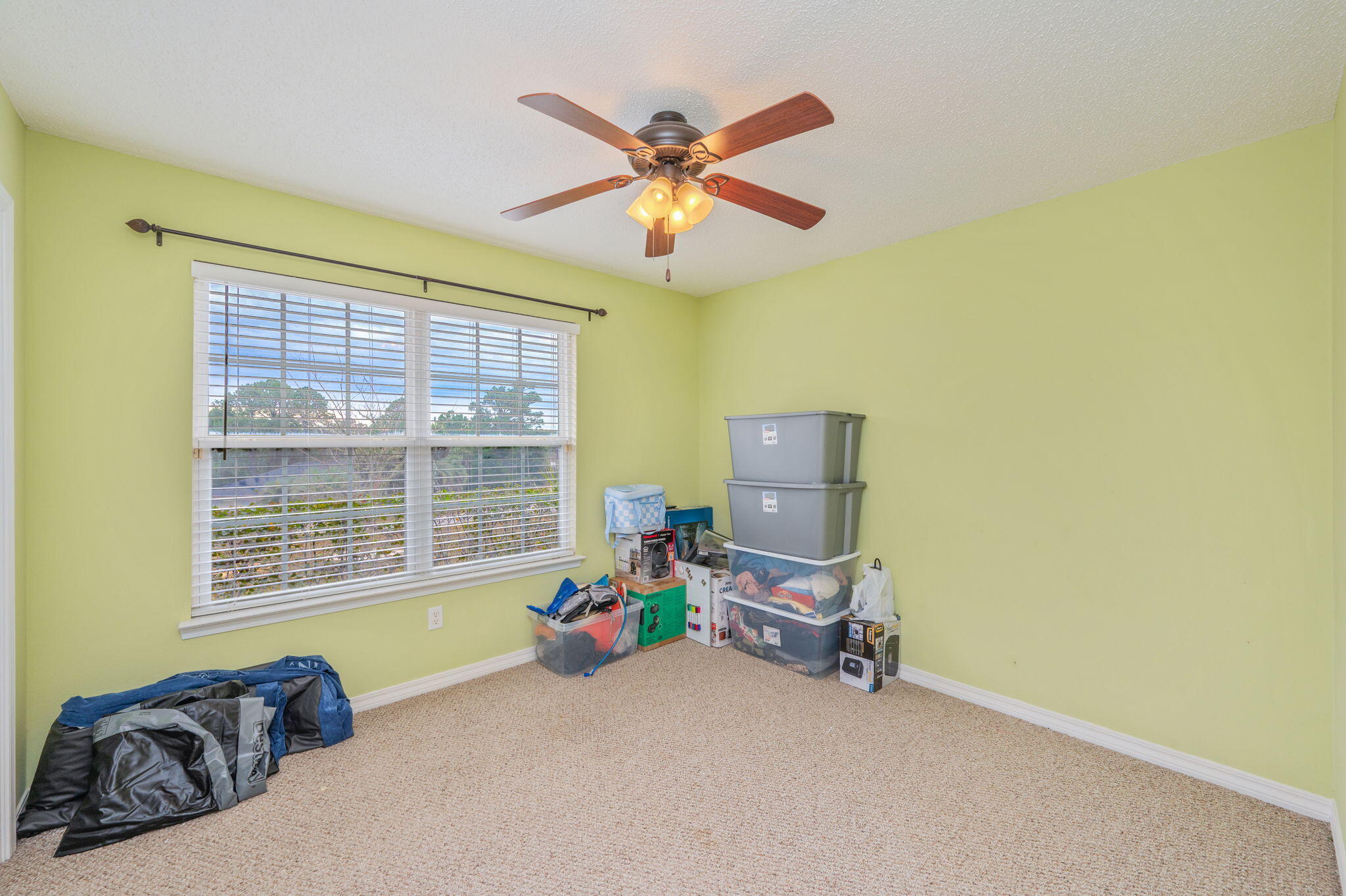 109 Tranquility Drive Crestview, FL 32536 - Photo 34 of 41 a living room with furniture and a window