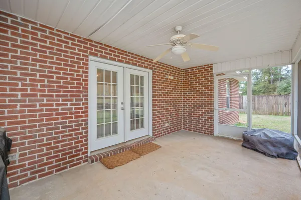 a view of an empty room with a balcony