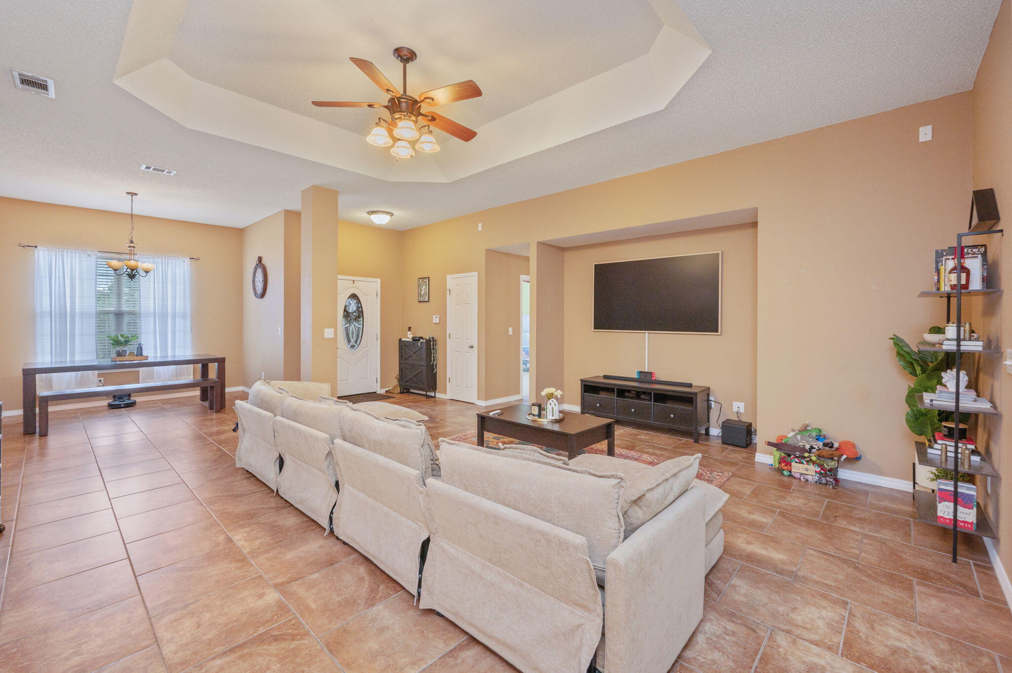 109 Tranquility Drive Crestview, FL 32536 - Photo 7 of 41 a living room with furniture and a flat screen tv