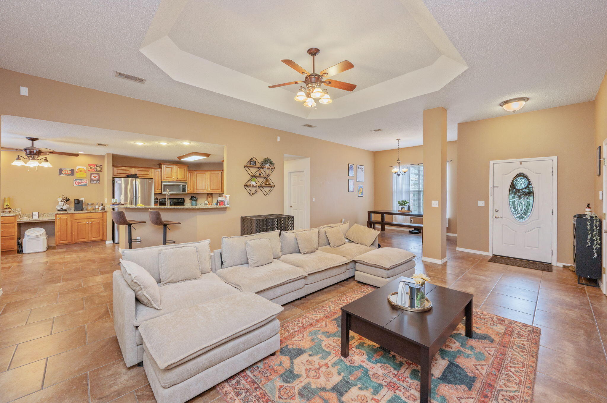 109 Tranquility Drive Crestview, FL 32536 - Photo 8 of 41 a living room with furniture and a view of kitchen