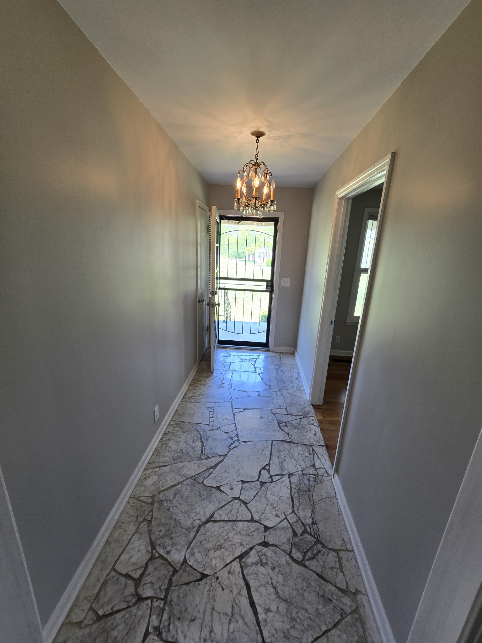 6350 Eatons Creek Road Joelton, TN 37080 - Photo 15 of 37 wooden floor in an empty room with a window