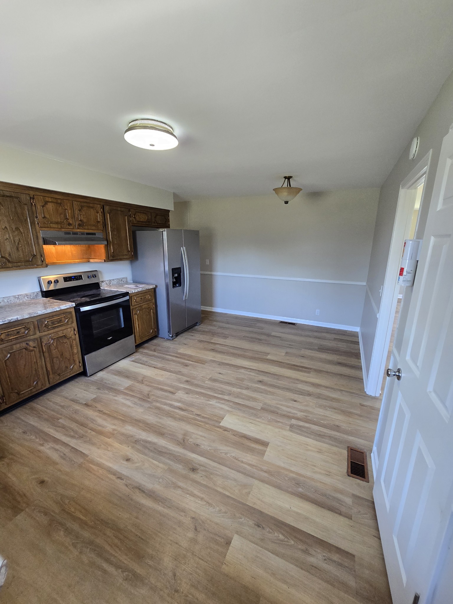 6350 Eatons Creek Road Joelton, TN 37080 - Photo 18 of 37 a spacious bedroom with a bed and a television