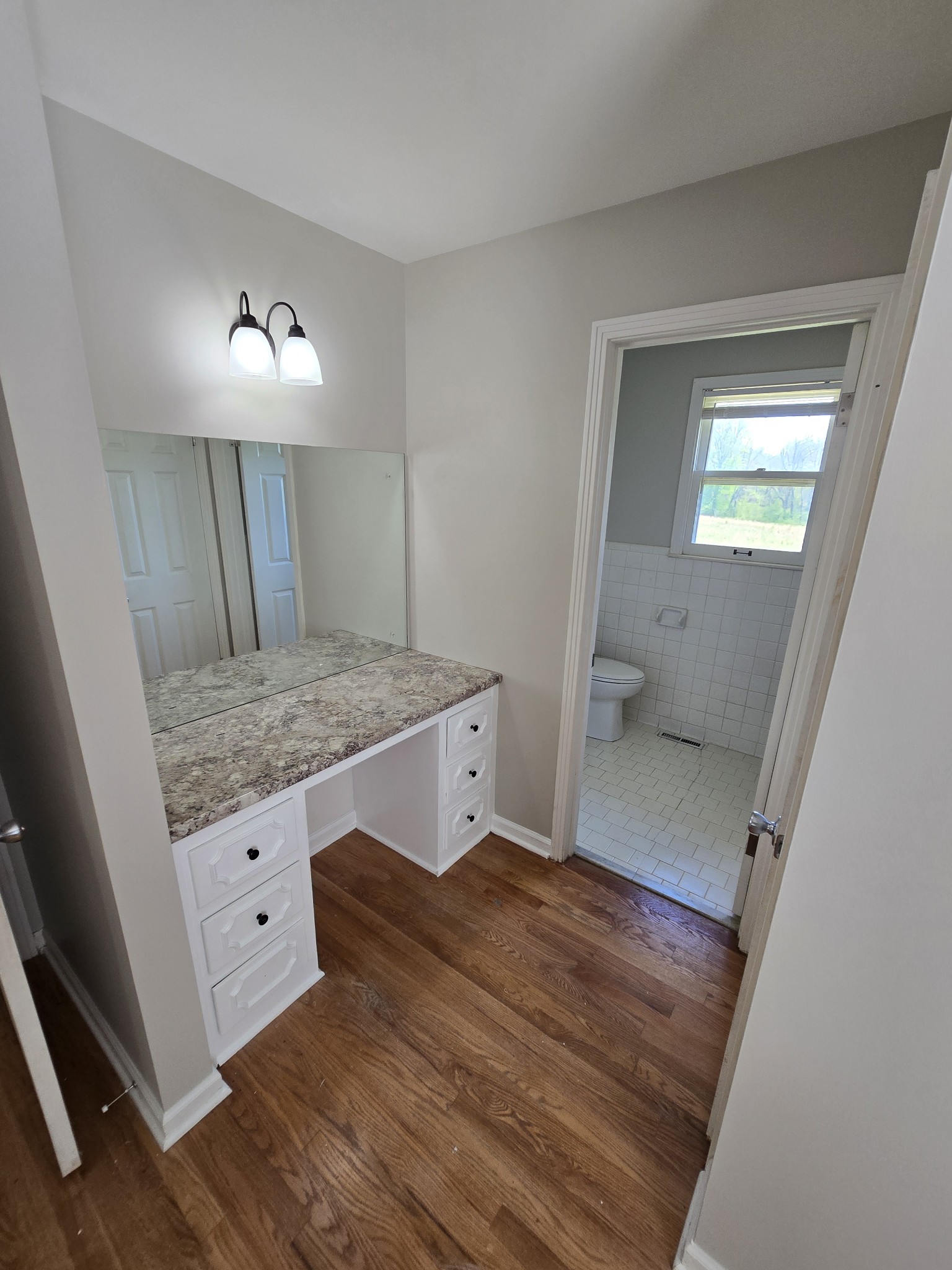 6350 Eatons Creek Road Joelton, TN 37080 - Photo 28 of 37 a view of bathroom with sink and mirror