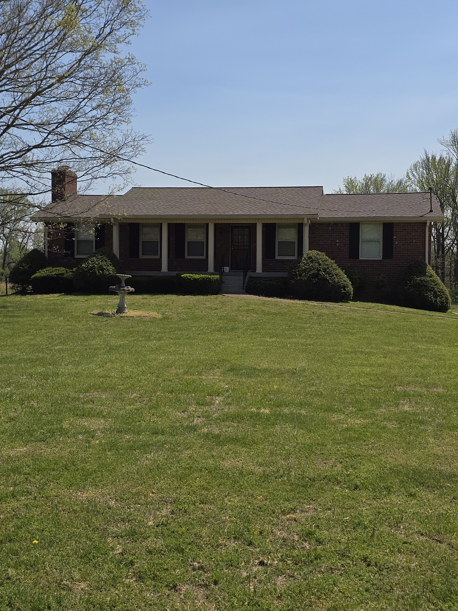 6350 Eatons Creek Road Joelton, TN 37080 - Photo 3 of 37 a front view of a house with a yard