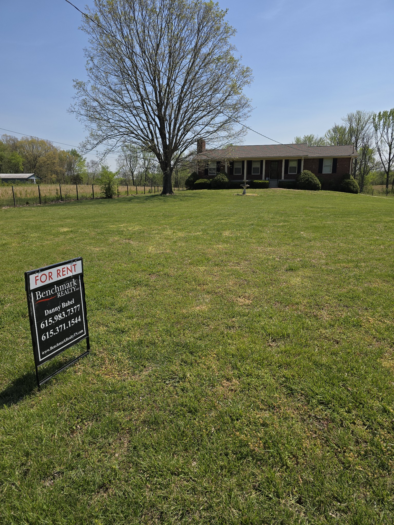 6350 Eatons Creek Road Joelton, TN 37080 - Photo 5 of 37 a view of a lake with a building in the background