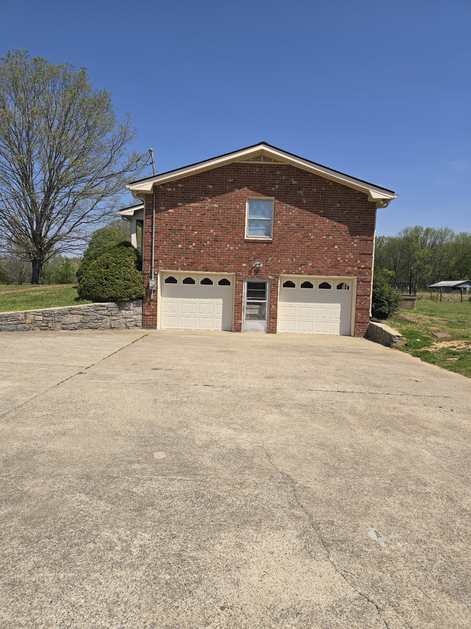 6350 Eatons Creek Road Joelton, TN 37080 - Photo 8 of 37 a front view of a house with a yard