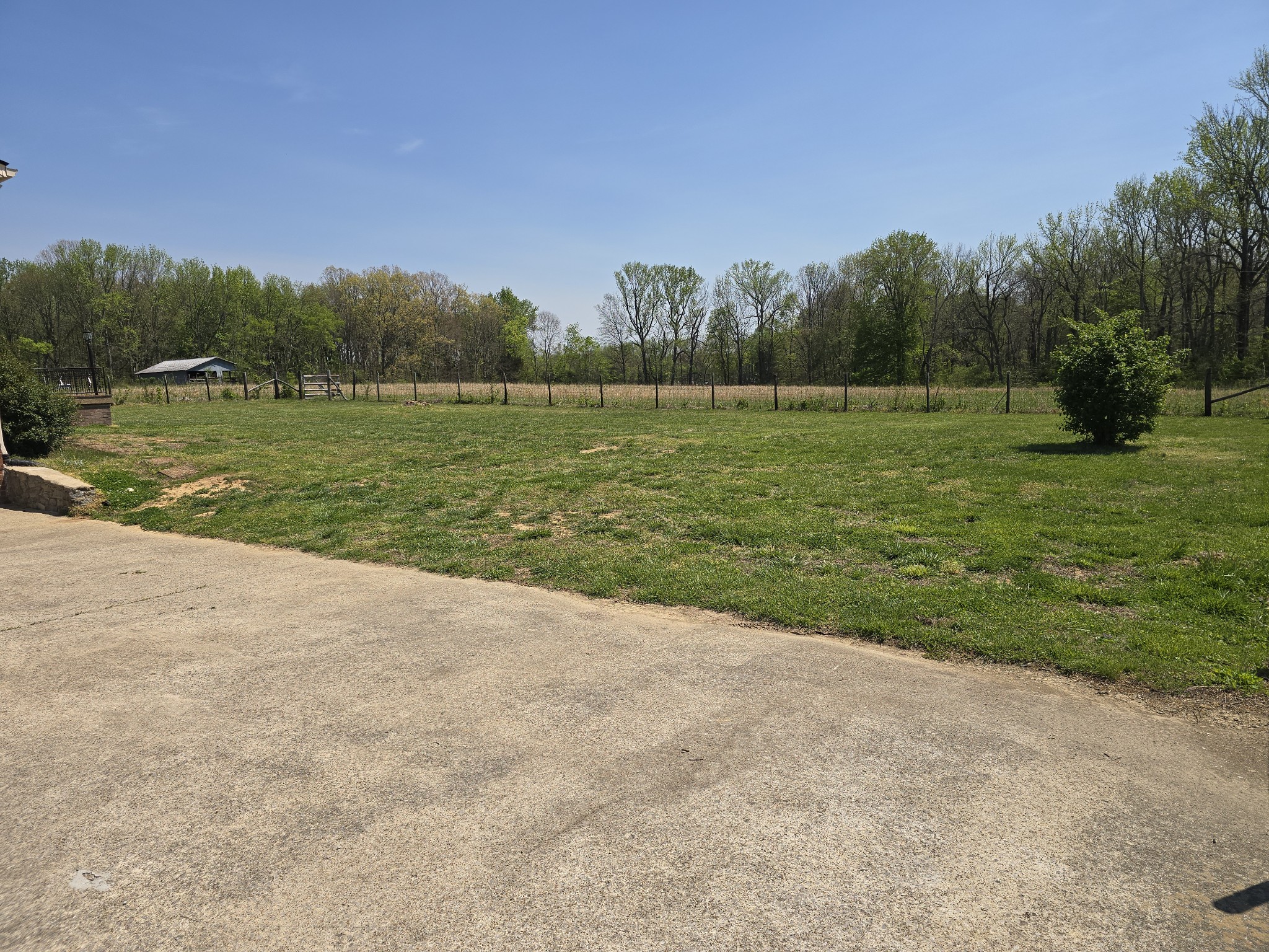 6350 Eatons Creek Road Joelton, TN 37080 - Photo 9 of 37 a view of a field with a yard