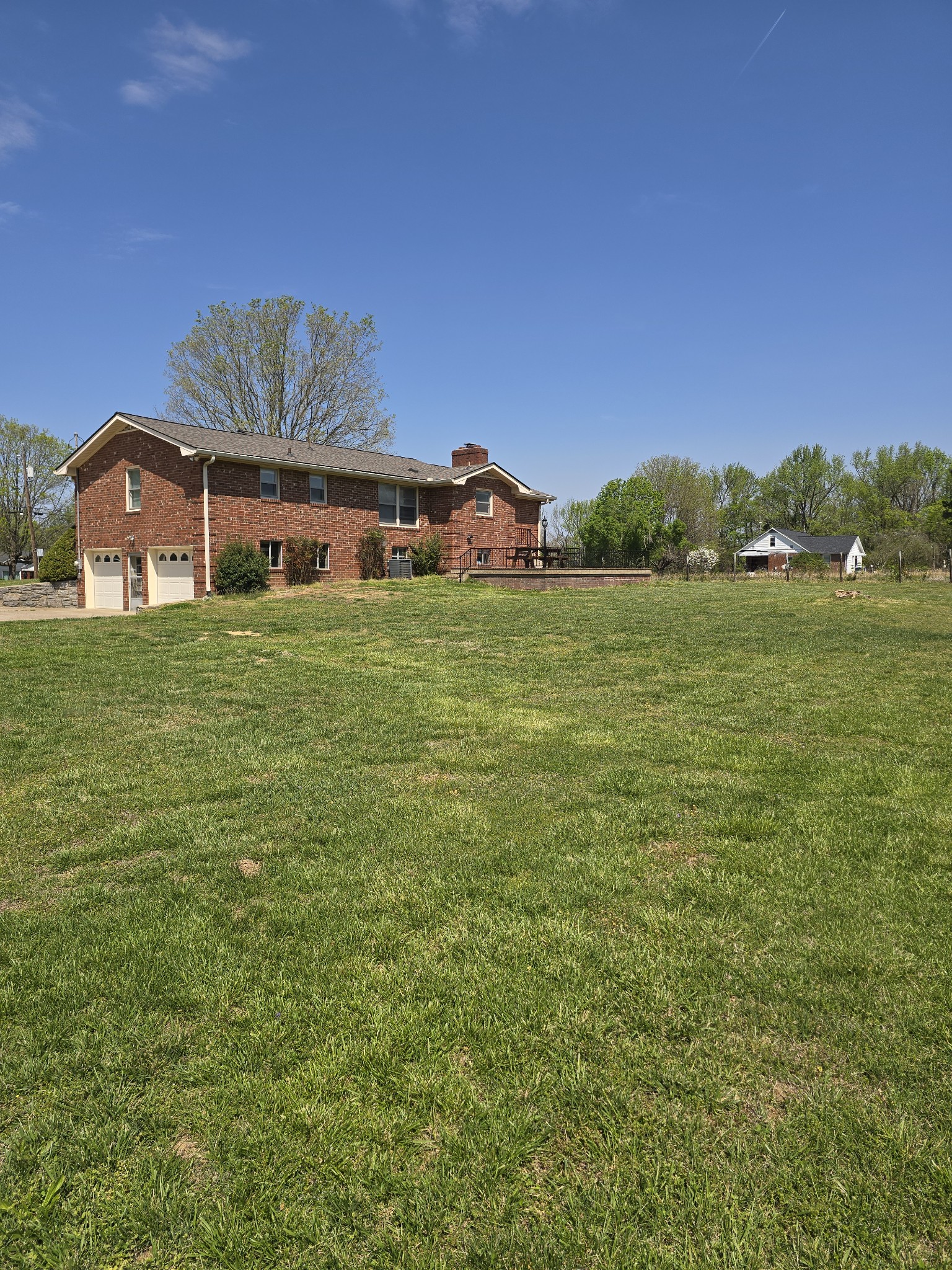 6350 Eatons Creek Road Joelton, TN 37080 - Photo 10 of 37 a front view of a house with a garden