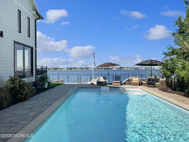 a view of a house with a door and wooden floor