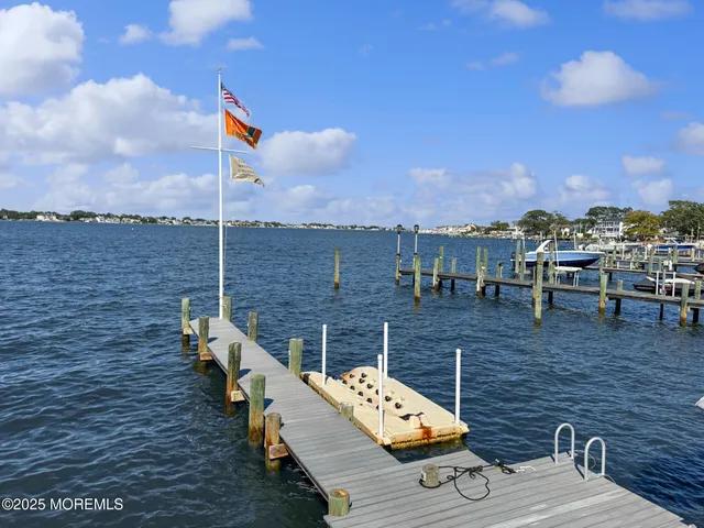 a view of roof deck with patio