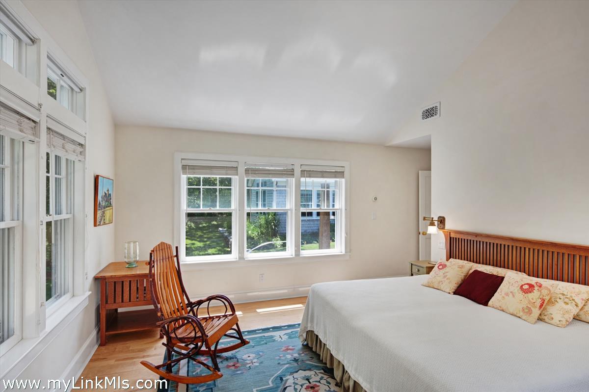 78 Hammett Road Chilmark, MA 02535 - Photo 38 of 53 a bedroom with a bed and a window