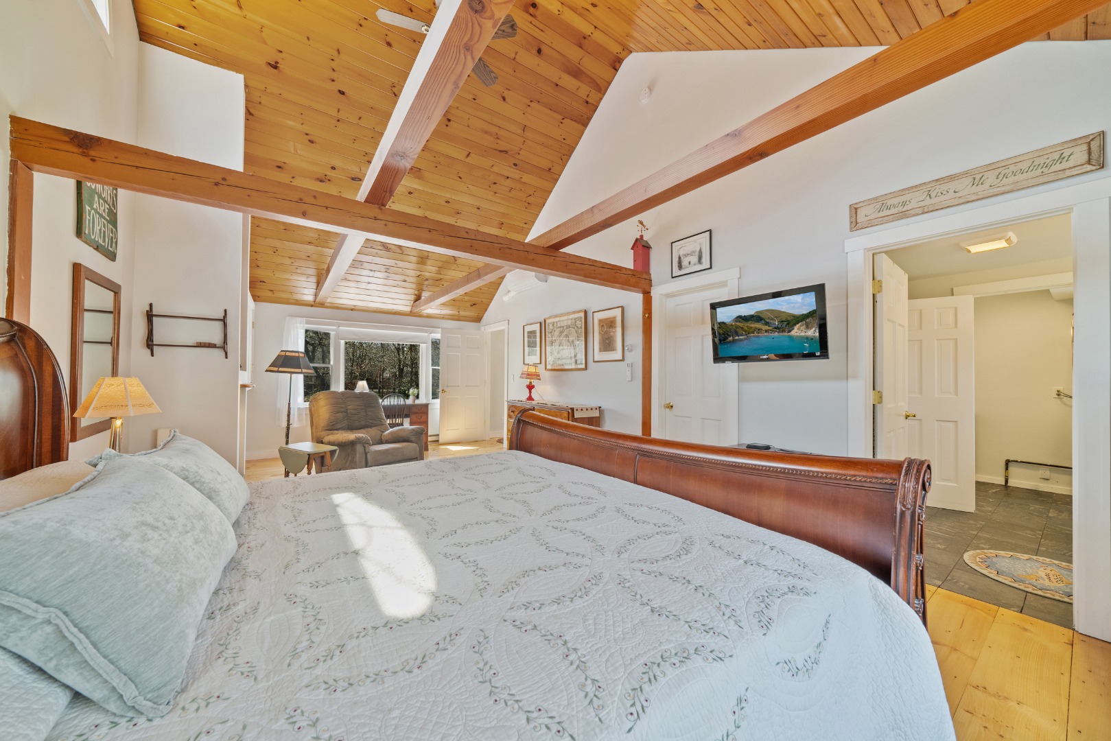 357 West Tisbury Road Edgartown, MA 02539 - Photo 14 of 33 a large white bed in a white room