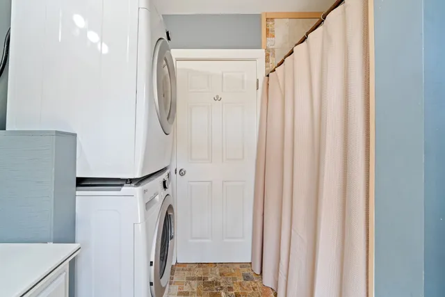 a view of living room washer and dryer