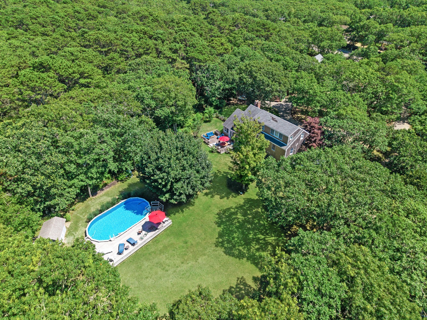 357 West Tisbury Road Edgartown, MA 02539 - Photo 33 of 33 an aerial view of a house with a yard and swimming pool