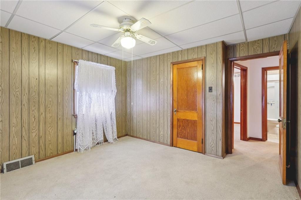 1111 Crowe Street New Castle, PA 16101 - Photo 21 of 37 an empty room with closet and a chandelier fan