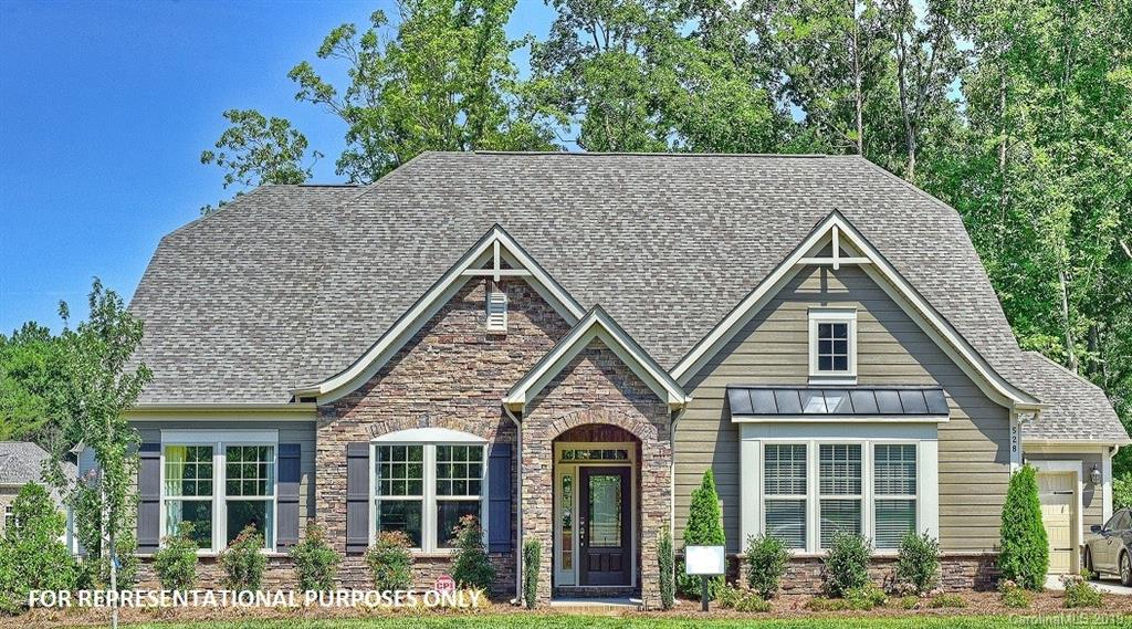 10004 Sunset Ridge, Unit 145 Midland, NC 28107 - Photo 1 of 1 a view of a house with a yard