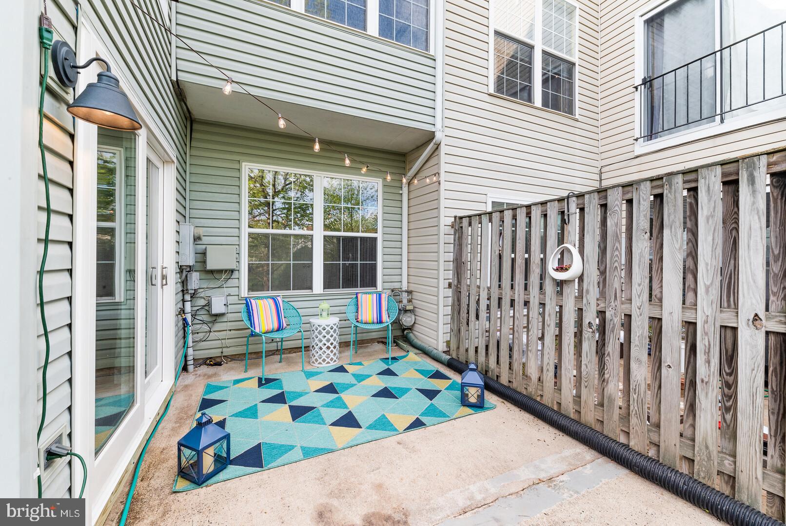 44099 Rising Sun Terrace Ashburn, VA 20147 - Photo 32 of 52 Enjoy the Cozy Patio w/Lake Views