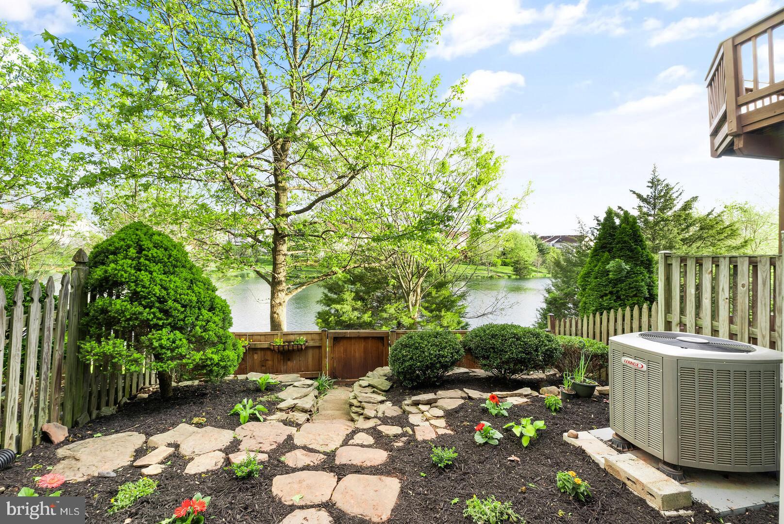 44099 Rising Sun Terrace Ashburn, VA 20147 - Photo 34 of 52 Low Maintenance Rear Yard Overlooking the Lake
