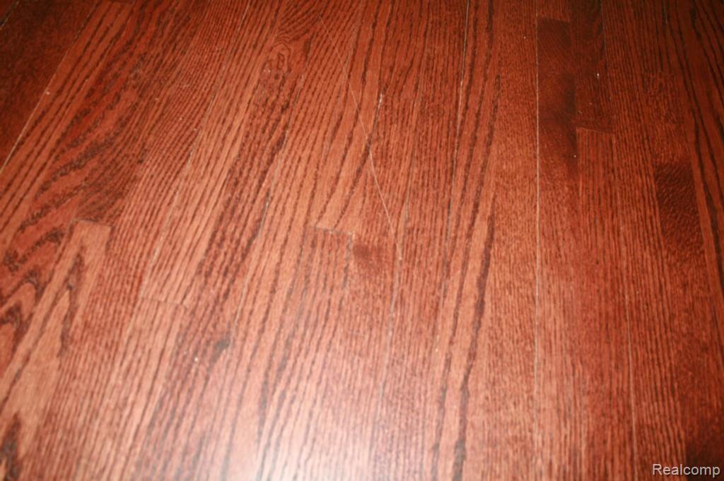303 Isbell Street Howell, MI 48843 - Photo 10 of 21 Hardwood floors.jpg