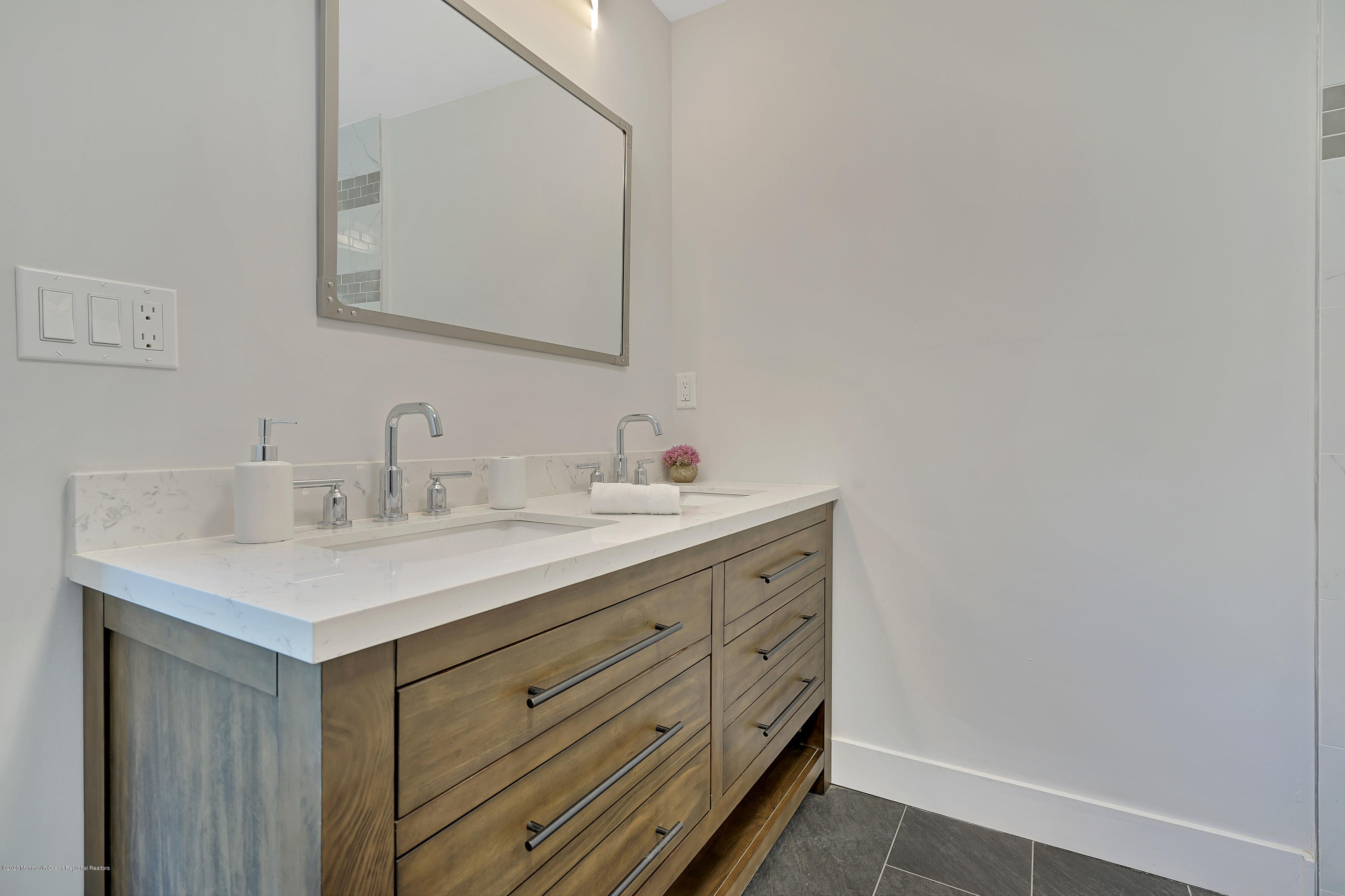 30 Jackson Mills Road Jackson, NJ 08527 - Photo 20 of 37 a bathroom with a sink and a mirror