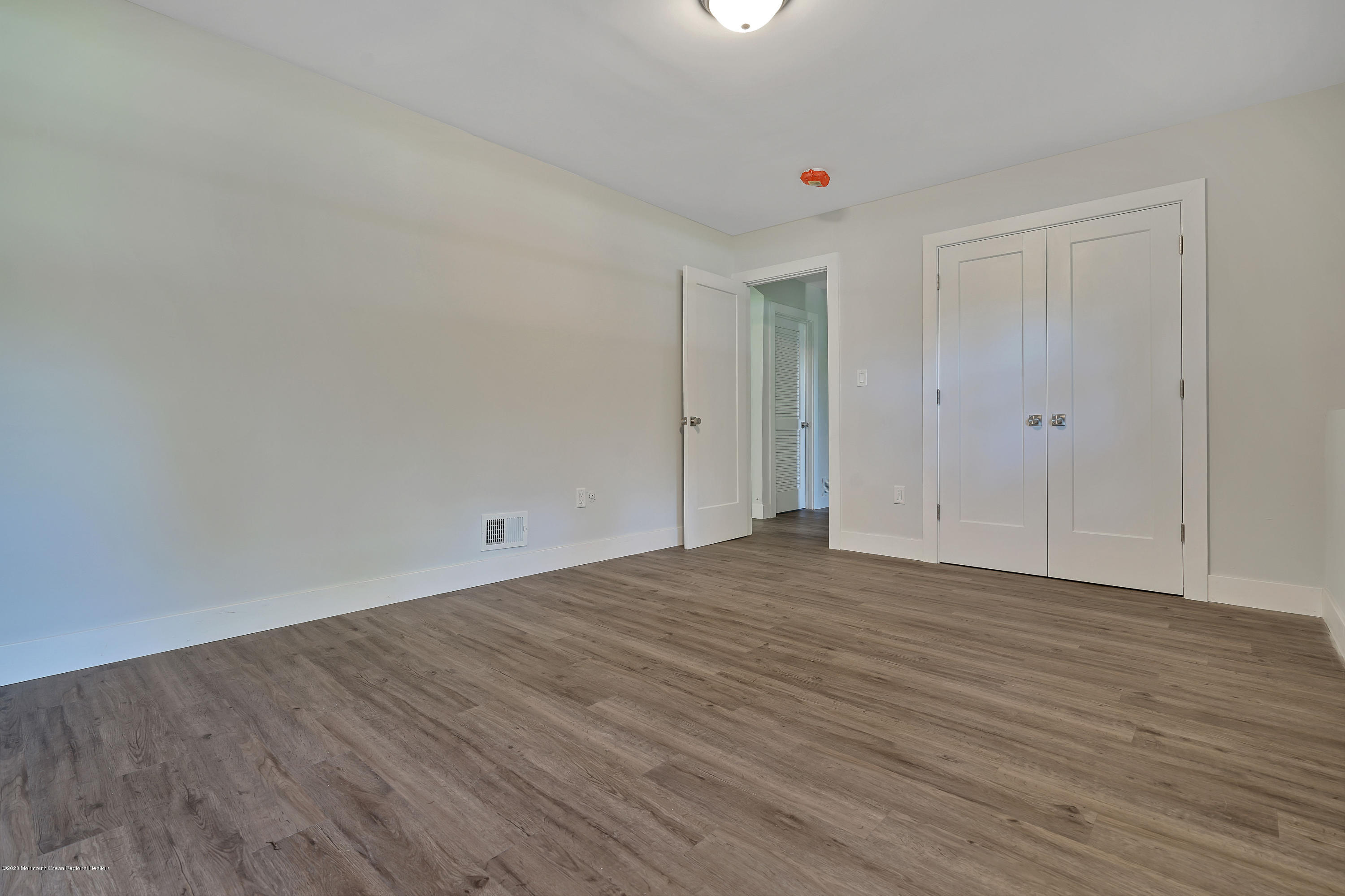 30 Jackson Mills Road Jackson, NJ 08527 - Photo 30 of 37 a view of an empty room and wooden floor