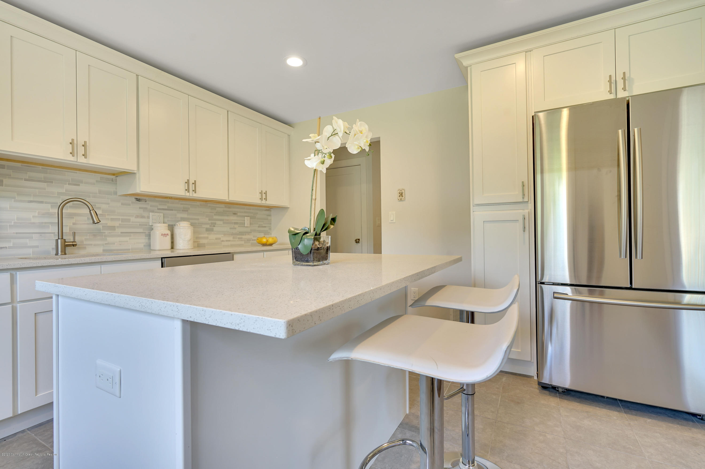 30 Jackson Mills Road Jackson, NJ 08527 - Photo 5 of 37 a kitchen with a sink a refrigerator and cabinets