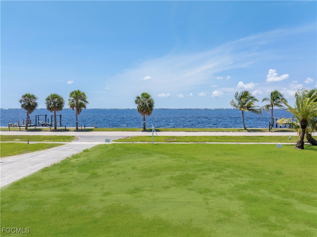 6105 West Riverside Drive Fort Myers, FL 33919 - Photo 4 of 8 a view of a green field