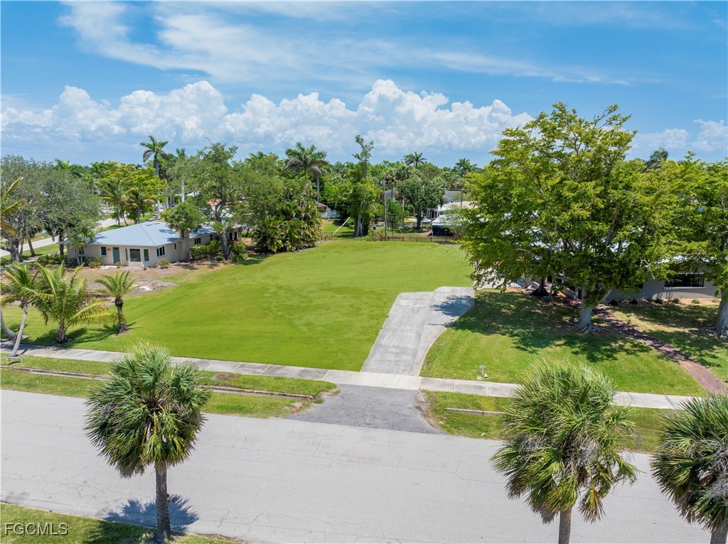 6105 West Riverside Drive Fort Myers, FL 33919 - Photo 8 of 8 a view of a golf course with a lake