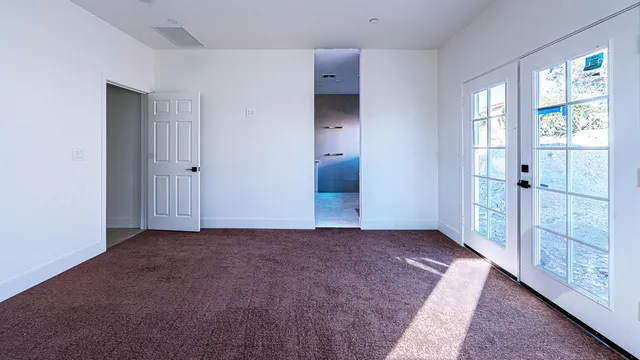 a view of an empty room with window
