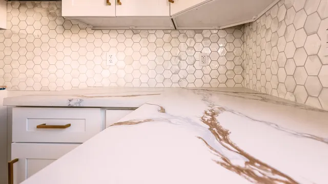 a bathroom with a bathtub and shower