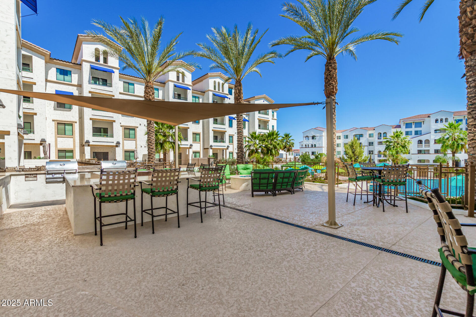 2511 West Queen Creek Road, Unit 340 Chandler, AZ 85248 - Photo 27 of 29 Enjoy the beautiful AZ days by the pool!