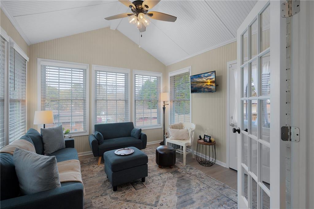 136 Meadow Lane Calhoun, GA 30701 - Photo 16 of 34 a living room with furniture and a flat screen tv