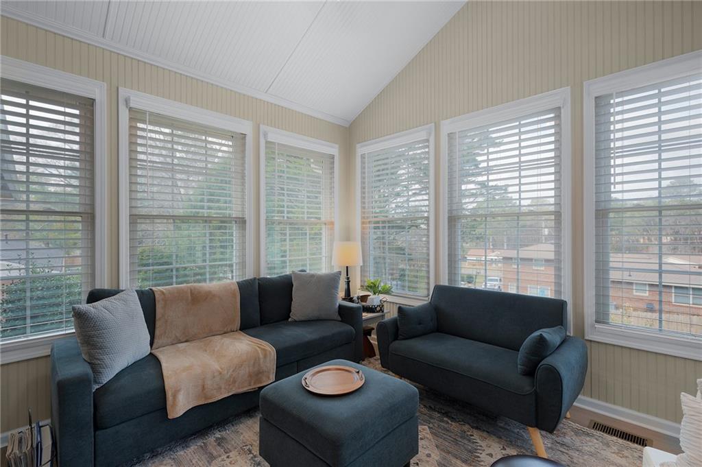 136 Meadow Lane Calhoun, GA 30701 - Photo 17 of 34 a living room with furniture and a large window