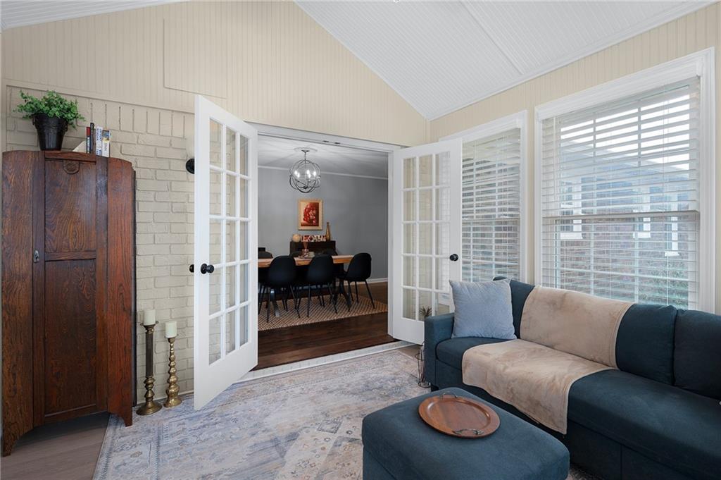 136 Meadow Lane Calhoun, GA 30701 - Photo 18 of 34 a living room with furniture and a large window