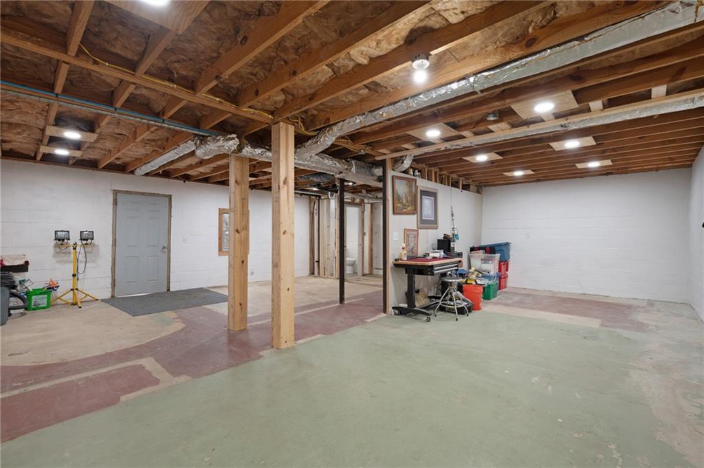 136 Meadow Lane Calhoun, GA 30701 - Photo 32 of 34 a view of a room with gym equipment