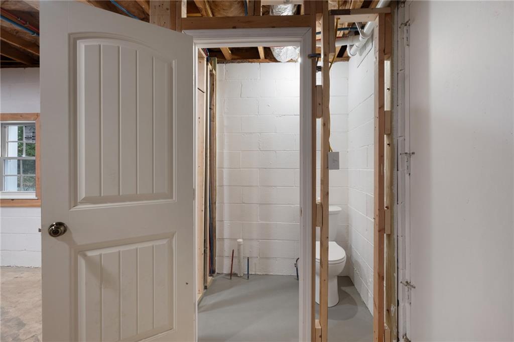 136 Meadow Lane Calhoun, GA 30701 - Photo 34 of 34 a view of a hallway with a glass door and a window