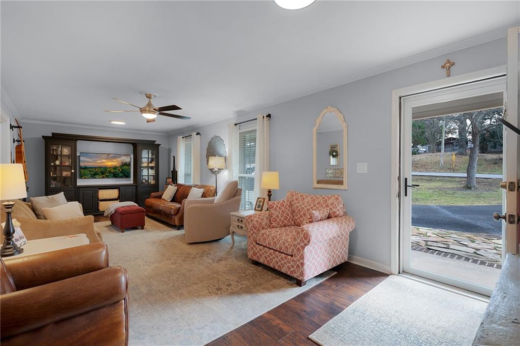 136 Meadow Lane Calhoun, GA 30701 - Photo 4 of 34 a living room with furniture and a glass door