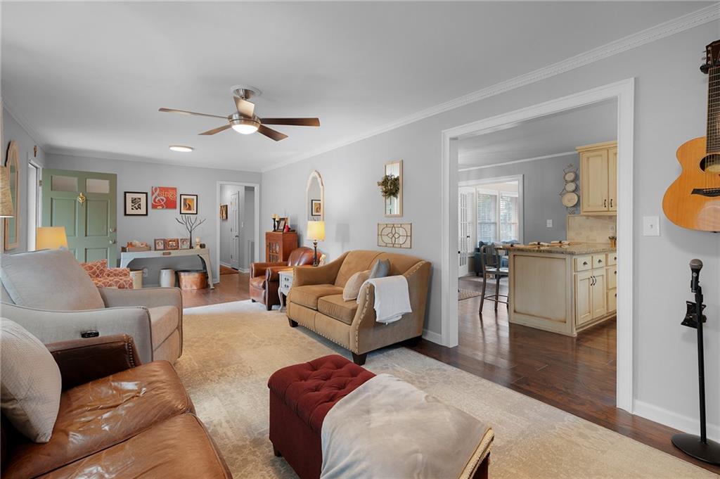136 Meadow Lane Calhoun, GA 30701 - Photo 7 of 34 a living room with furniture and wooden floor