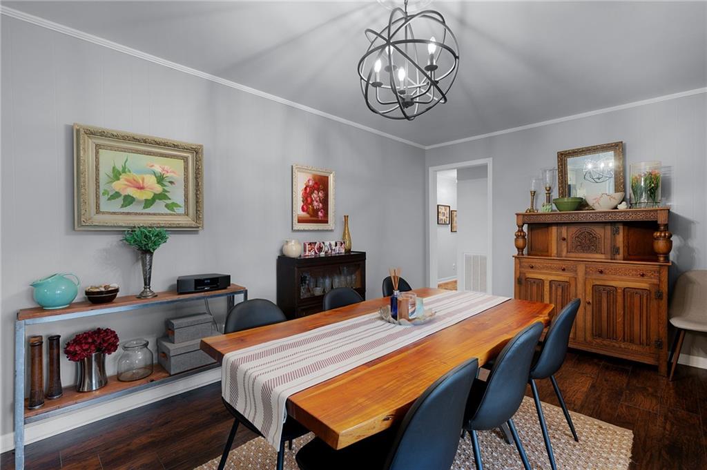 136 Meadow Lane Calhoun, GA 30701 - Photo 9 of 34 a view of a dining room with furniture and wooden floor
