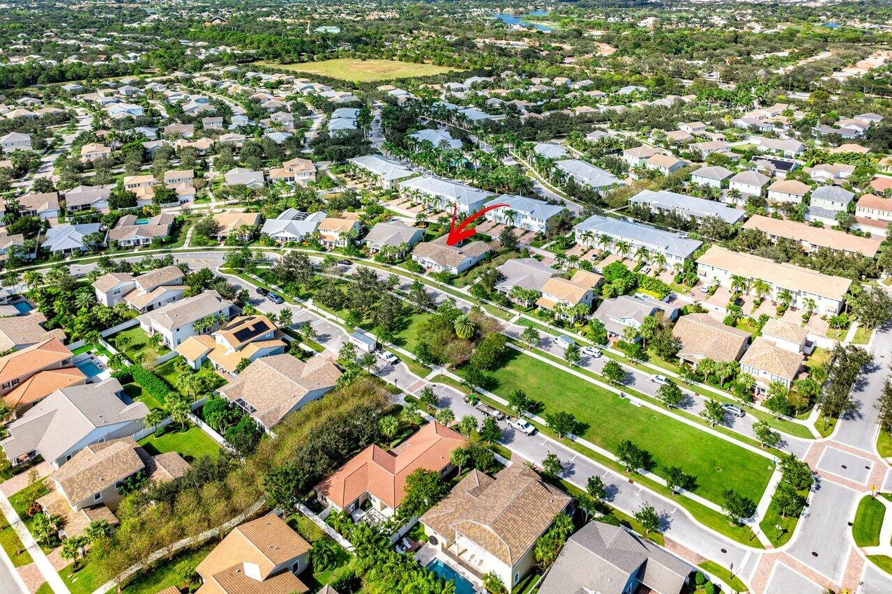 1131 North Prescott Drive Jupiter, FL 33458 - Photo 45 of 72 an aerial view of residential houses with outdoor space