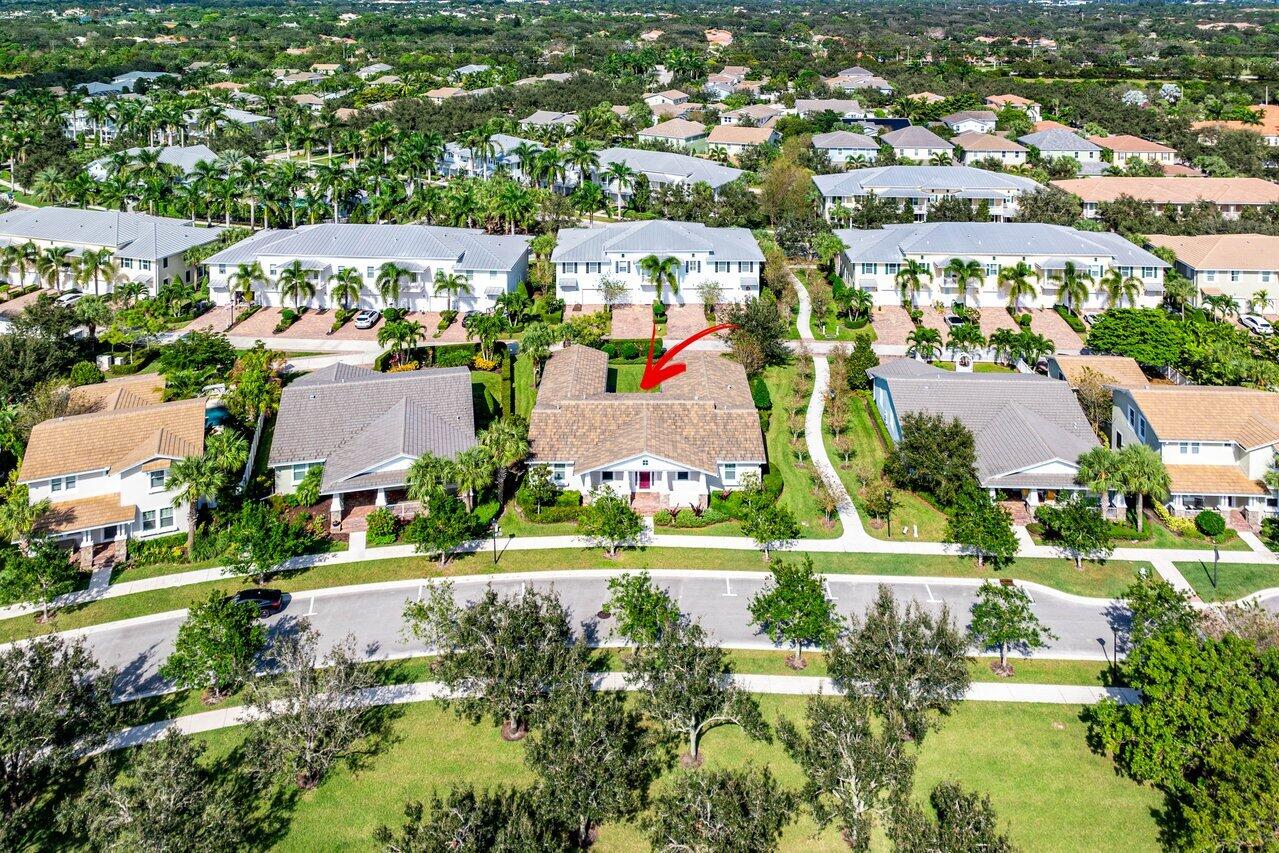 1131 North Prescott Drive Jupiter, FL 33458 - Photo 46 of 72 an aerial view of residential houses with outdoor space and lake view