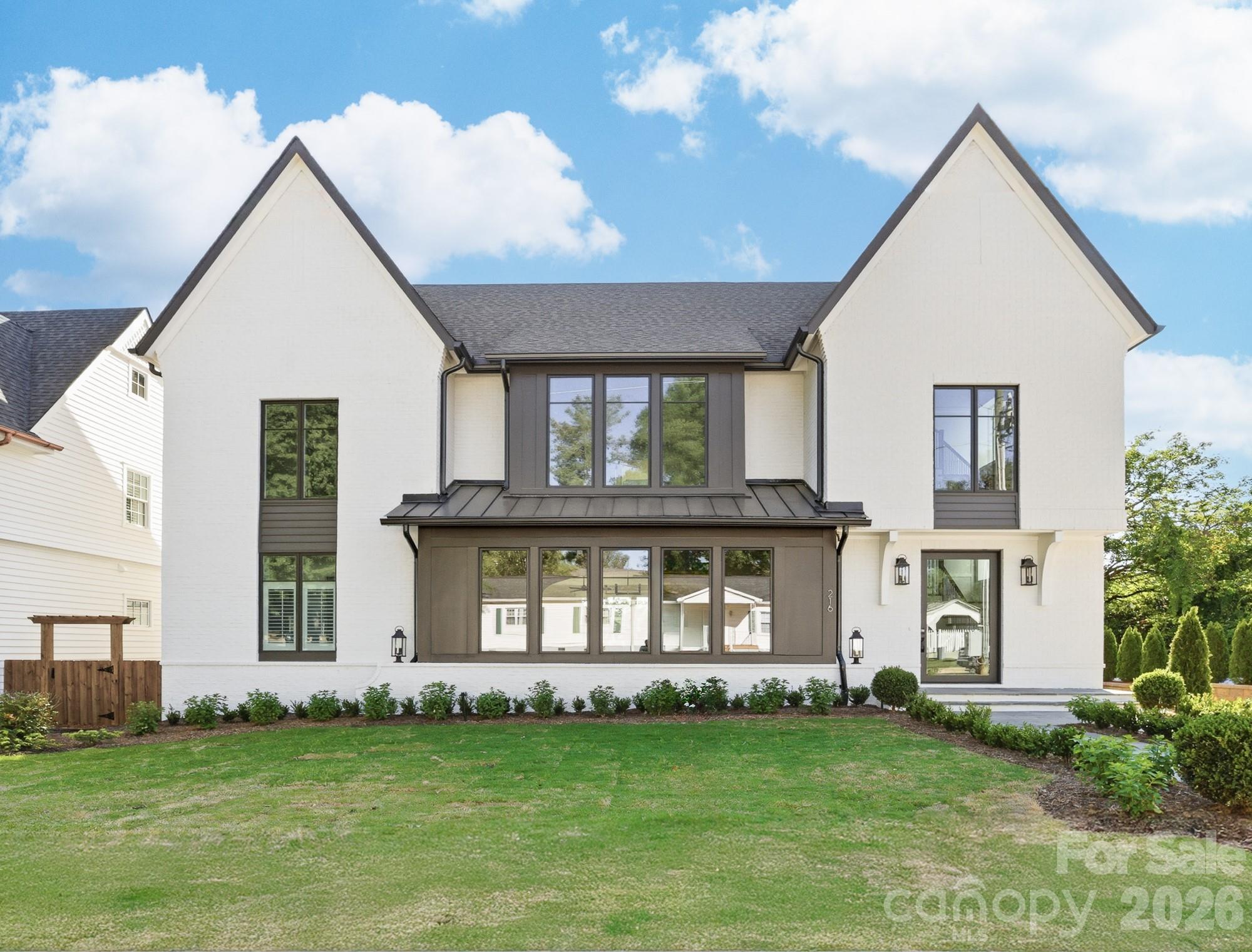 216 Walnut Street Davidson, NC 28036 - Photo 1 of 48 a view of a house with a yard