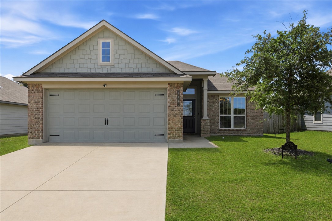 2725 Porter's Way Bryan, TX 77803 - Photo 2 of 19 a front view of a house with a yard