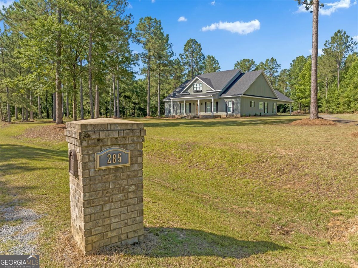 a view of a house with a ocean view